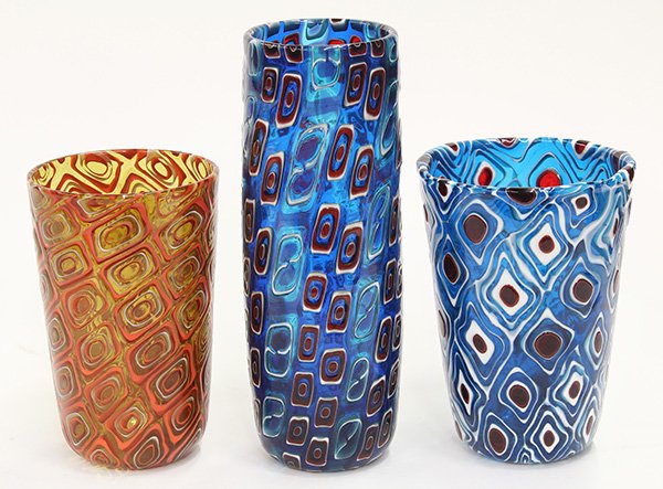 Art glass vases by Michael Nourot (American b: (lot of 3) Art glass vases by Michael Nourot (American b.1949), circa 1976-1981, each vase of cylindrical form, having repeating geometric patterns executed in the Venetian murrini technique, in multi