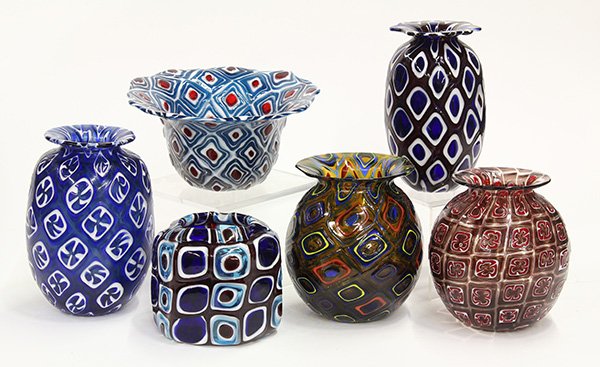 Art glass vases by Michael Nourot (American b.1949): (lot of 6) Art glass vases by Michael Nourot (American b.1949), circa 1980, each having repeating geometric patterns executed in the Venetian murrini technique, in multiple colors, each signed "Nourot