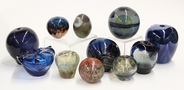 Art glass bud form and paperweight vases: (lot of 11) Art glass bud form and paperweight vases, consisting of a Lundberg Studios egg form vase decorated with green and white ovals on a polychrome spiral decorated ground, signed "Lundberg 72";