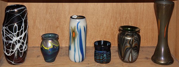 Group of associated art glass: (lot of 6) Group of associated art glass, consisiting of (2) Orient & Flume vases, both of cylindrical form, one in iridescent eggplant glass with applied white abstract stringing, signed 'O & F 1973'