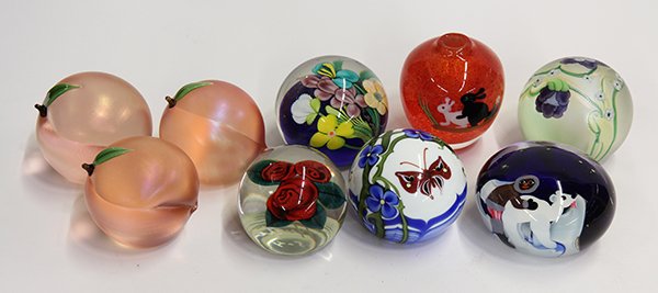 Orient & Flume art glass paperweights: (lot of 9) Orient & Flume art glass paperweights including animal erotica, iridescent peaches, and flowers, signed by L. Hudin, Gary Jones, Alexander, and Scott Beyers, most with boxes