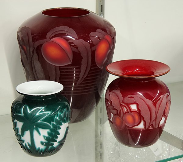 Cameo art glass by Valerie Surjan for Michael Nourot: (lot of 3) Cameo art glass including two executed in red having a peach tree pattern, signed Valerie Surjan Nourot, largest: 8.25"h x 7"w