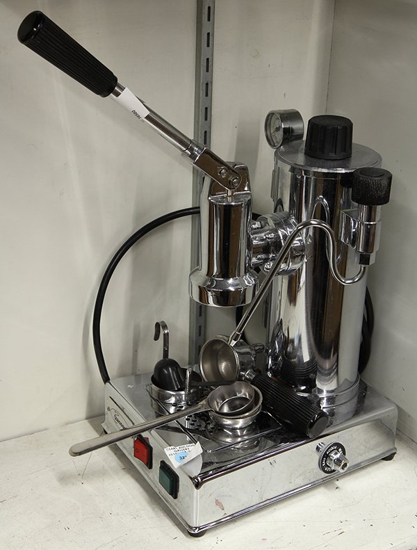 Zacconi Riviera espresso machine: Zacconi Riviera espresso machine, the chrome-plated bronze body on a metal base fitted with rubber feet, and having a 12 cup capacity, instructions with specific features included
