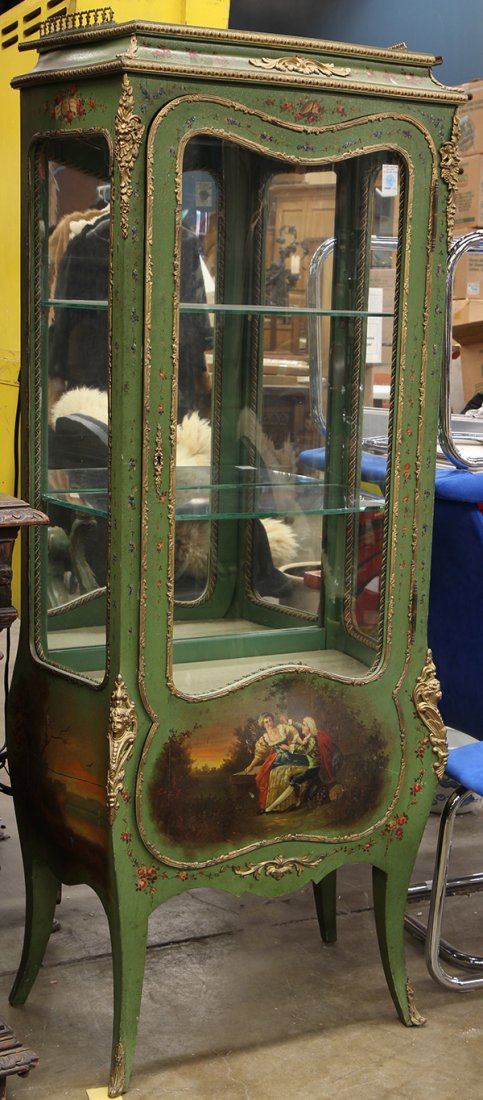 Louis XVI style vitrine: Louis XVI style vitrine, executed in gilt brass and paint decorated wood, having a pierced brass gallery surmounting a sage green case with floral sprays having a glazed door and side lights, door ope