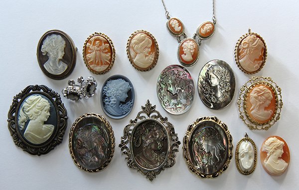 Collection of cameos: (Lot of 16) Collection of cameo jewelry including four unmounted cameos, one of them a hardstone and three are shell; twelve cameos set in pendant frames, brooch mountings, earrings and necklaces, mos