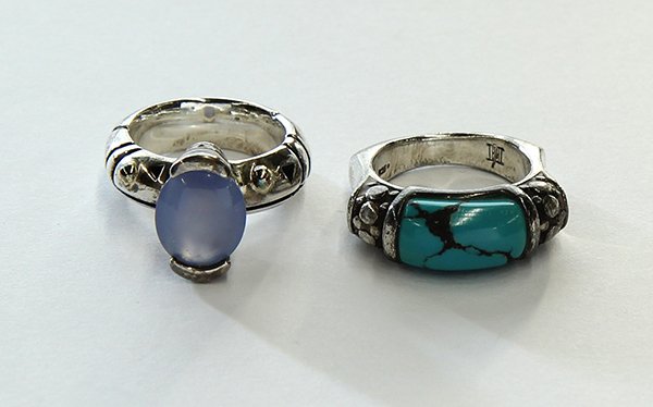 Collection of sterling silver rings: (Lot of 2) Sterling silver rings including a sterling silver, 18k gold and blue chalcedony ring, size 6 1/4, together with a sterling silver and turquoise saddle ring, size 7. Combined total weight fo