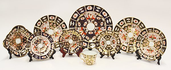 Royal Crown Derby Imari table service: (lot of 59) Royal Crown Derby Imari table service for eight plus extras, in the classic Imari pallet of navy, orange, and gold, having the Royal Crown Derby mark, consisiting of (9) dinner plates, 10.