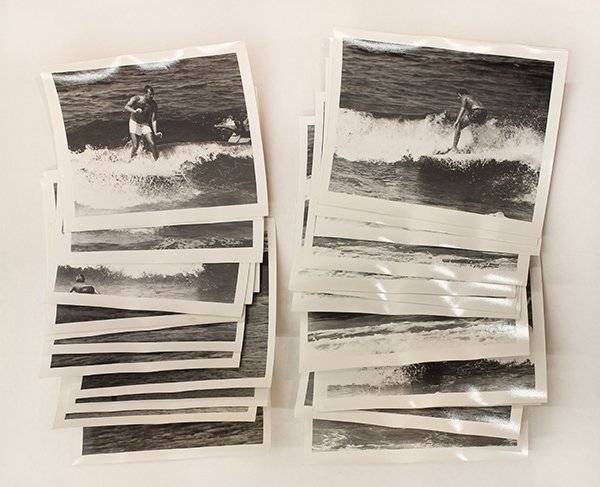 Surfing photographs by LeRoy Grannis: (lot of 28) LeRoy Grannis (Californian, 1917-2011), ''Surfing - 22nd Street Pier (California),'' 1960, each stamped ''Jul 29, 1960'' verso, print (each): 4''h x 5''w. Provenance: Estate of LeRoy Grann