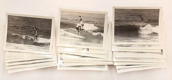 Surfing photographs by LeRoy Grannis: (lot of 31) LeRoy Grannis (Californian, 1917-2011), ''Surfing - 22nd Street Pier (California),'' 1960, each stamped ''Aug 10, 1960'' verso, print (each): 4''h x 5''w. Provenance: Estate of LeRoy Grann