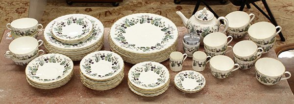 Royal Worcester partial table service in the "Lavinia": (lot of 51) Royal Worcester partial table service in the "Lavinia" pattern, decorated with a repeating floral motif in purple berries and green, consisting of (9) dinner plates, 10.5"dia; (9) luncheon
