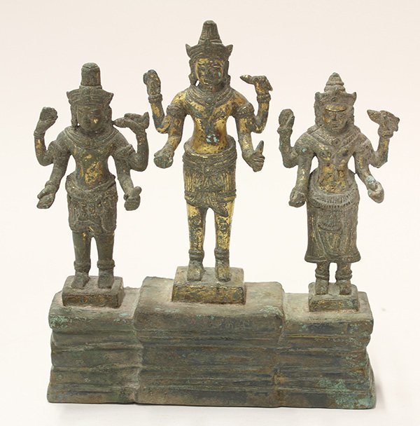 Burmese Bronze Hindu Trinity: Burmese cast bronze Hindu trinity, Ankor Wat period/12th century, each deity with four arms standing on a stepped base, with traces of gilt, 8"h ×6.5"w ×2"d; Provenance: Borisoothi Antiques, Chiengm