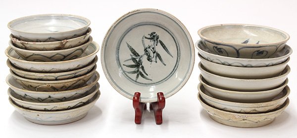 Group of Small Vietnamese Porcelain Plates: (lot of 17) Group of Vietnamese small blue and white porcelain plates, with bamboo in the center and lotus pattern on the exterior, from Hoi An Hoard, largest: 5.25"w; Provenance: Butterfields, 2000