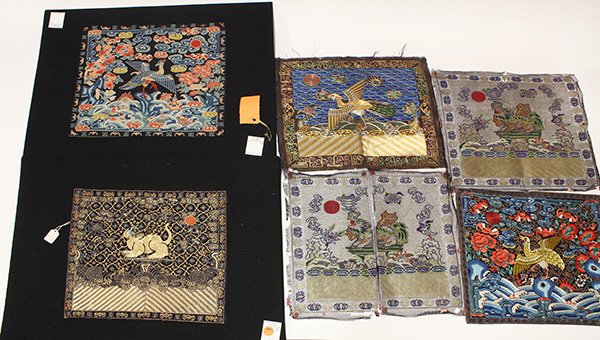 Six Chinese Rank Badges: (lot of 6) Chinese rank badges, one of a pheasant perching on a rock amid the waves and eight Buddhist treasures, the sky decorated with peaches, bats, and peonies, the second with a lion facing towar