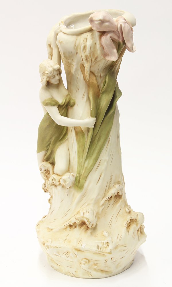 Royal Dux porcelain Art Nouveau vase: Royal Dux porcelain Art Nouveau vase, having a naturalistic tree trunk form accented with a seated beauty and flowers, stamped "Royal Dux, Bohemia", 16"h