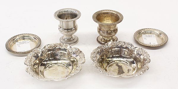 (lot of 6) Silver table articles: (lot of 6) Silver table articles, consisting of a pair of fruit bowls with repoussÃ© floral rims, marked silver, 1.5"h x 5"dia; a pair of sterling Fisher urn form toothpick holders, rising on circul