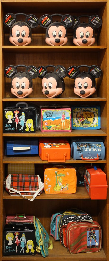 Collection vintage lunch boxes: (lot of 26) Collection of vintage lunch boxes including (6) Micky Lunch Kits; The World Of Barbie; S.W.A.T.; Superman; Barbie and Francie; Lunchtime with Snoopy, etc., some executed in metal (paint lo