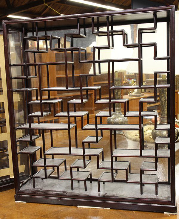 Asian style rosewood display cabinet: (lot of 2) Chinese rosewood display cabinets, having staggered shelves housed within an three panel glass case, and rising on a molded base, 33"h x 29"w x 8"d