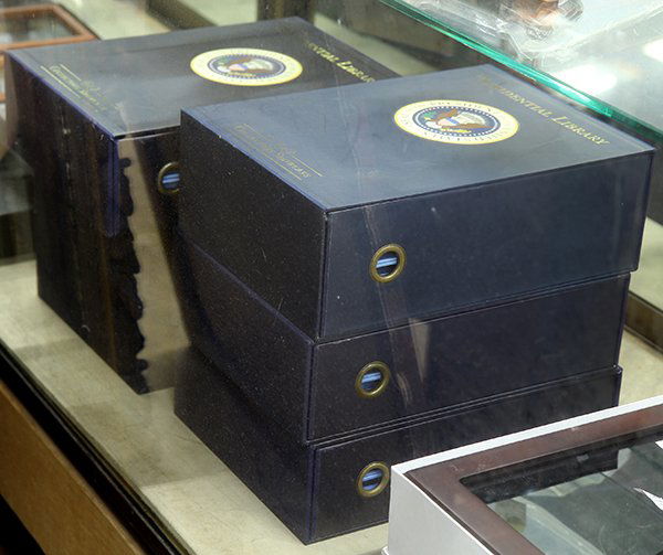 Presidental dollar coins in wooden boxes: Presidental dollar coins in wooden boxes or slip case folios including (2) 2007 S 4 dollar coins sets; (1) 2008 S 4 piece set, all ICG PR 70 DCAM; 2009 (8) United States Presidential Dollar coin set,