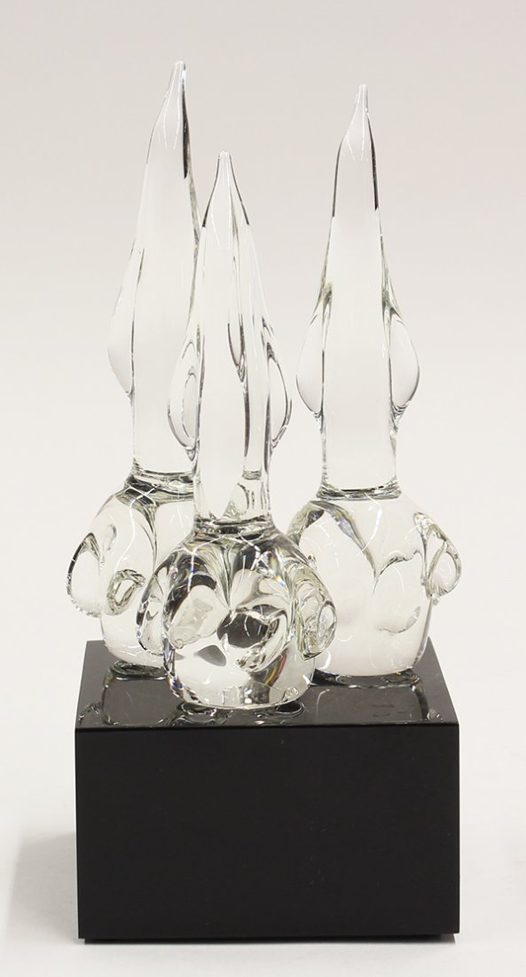 Cartier crystal figural sculptures of penguins: Cartier crystal figural sculptures of penguins, in three parts, possibly stoppers, mounted on a square stand with etched signature, 7.75"h x 3.5"dia., Property from a private collection to benefit Hon
