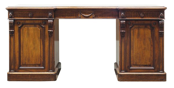 Regency mahogany sideboard: Regency mahogany sideboard, executed by by Edward and Roberts circa 1830, the shaped top above three drawers, accented with carved swags and rosettes, the two door case having acanthus mounts, and ris