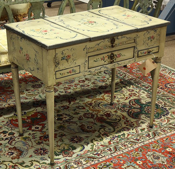 Continental polychrome decorated vanity: Continental polychrome decorated vanity, 18th/19th century, the three part top centered with paint decorated floral reserves, the center of which opens to reveal a mirror, and is flanked by compartmen