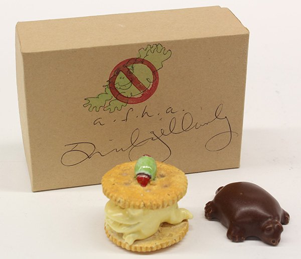 Sculptures, David James Gilhooly: (lot of 2) David James Gilhooly (American, b. 1943), Frog Cracker, 1988, and Chocolate Turtle, 1988, glazed ceramic sculptures, each signed, encased in a cardboard box signed by the artist with a draw