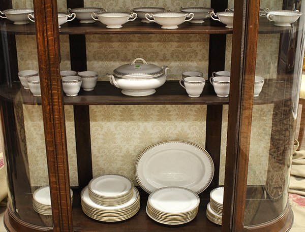 Spode partial table service in the Warwick pattern: (lot of 58) Spode partial table service in the Warwick pattern consisting of (9) dinner plates, 10.5"dia.; (9) salad plates; (9) bread plates; (9) dessert plates; (10) consommes and (8) saucers; (10) 