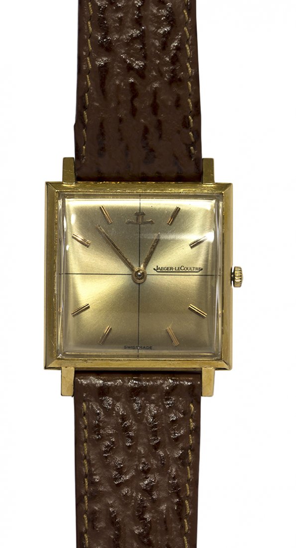 Gentleman's Jaeger-LeCoultre yellow gold wristwatch: Gentleman's Jaeger-LeCoultre 18k yellow gold wristwatch contains a Jaeger-LeCoultre manual wind movement #1691271, champagne dial with applied baton markers, square 18k yellow gold case with four scre