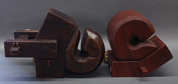 : Two Japanese Wood Daikoku Jizai Kagi Hooks/Pulleys: (lot of 2) Japanese large Daikoku kassha (pulley) for jizai kagi, 19th century, carved from thick blocks of keyaki wood, largest, 17"l. Provenance: From the estate of Edward Gerber