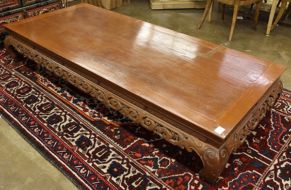 Chinese-style Wood Platform Bed: Chinese-style platform bed (ta), the pierced apron carved with gui-dragons, raised on shaped supports, 80"w