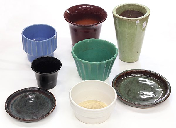 Art pottery group, mostly California: (lot of 8) Art pottery group, mostly California, consisting of planters and associated under trays, by various makers such as Bauer, and Panama pottery, designed in various styles including ribbed, an