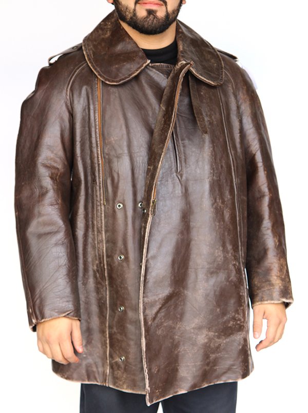 1940's French aviator leather jacket made by Uceber and: 1940's French aviator leather jacket made by Uceber and Barney, with rounded collar, zipper and snaps,
