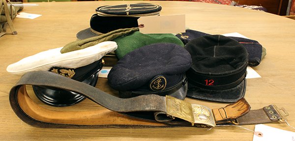 (lot of 15) Associated Military hats and belts: (lot of 15) Associated Military hats and belts including a WWII French officers sword belt, a French Foreign Legion hat, Soviet Navy hat, American berets and field hats,etc.