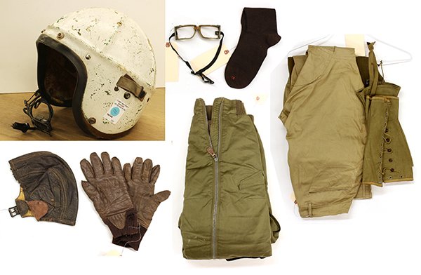 (lot of 9) U.S military uniform group: (lot of 9) U.S military uniform group, including a U.S Navy Aviation cap, gloves, and goggles, military issue Type A-AA trousers, socks, etc.