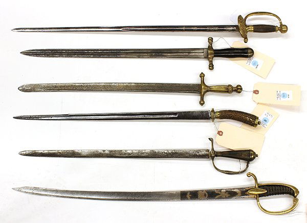 (lot of 5) Continental short swords: (lot of 5) Continental short swords, mostly 19th century, including and example with an ebonized hilt and brass cross guard having a blade with a double fuller, the mark is partially obscured but may