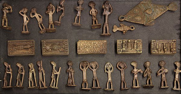 Ghana, West Africa, cast brass figurative objects: (lot of 29) Ghana, West Africa, cast brass figurative objects, based upon gold-weight figurines, but decorative, including five small boxes in the gold dust style, depicting animals, two fish pendants