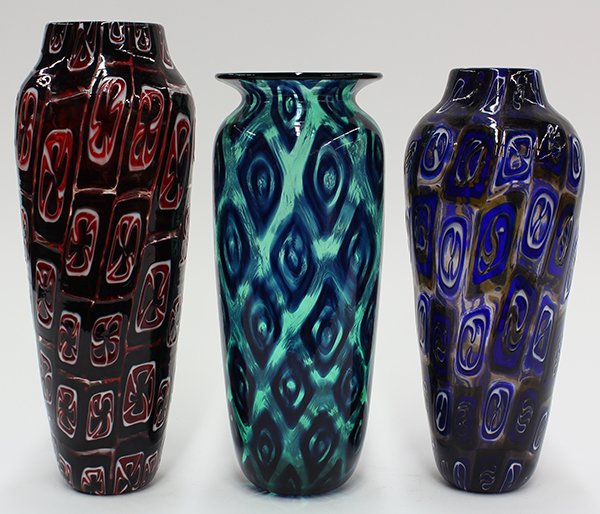 (lot of 3) Art glass vases by Michael Nourot (American: (lot of 3) Art glass vases by Michael Nourot (American b.1949), circa 1980, each vase of cylindrical form, having repeating geometric patterns executed in the Venetian murrini technique, in blue on ol