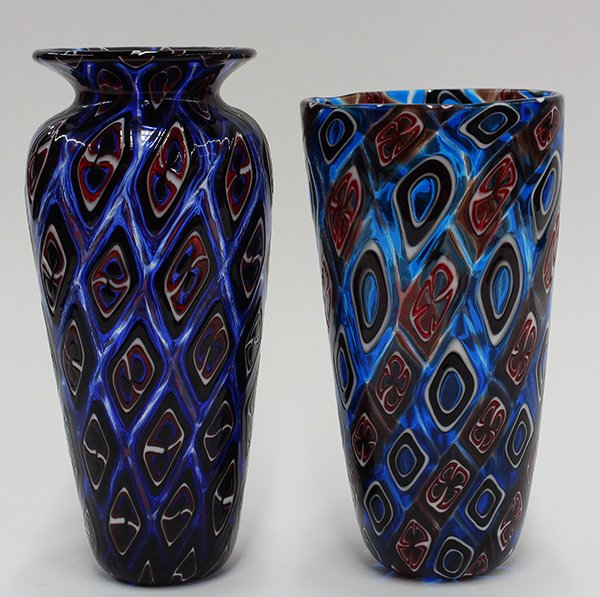 (lot of 2) Art glass vases by Michael Nourot (American: (lot of 2) Art glass vases by Michael Nourot (American b.1949), circa 1980, each vase of cylindrical form, having repeating geometric patterns executed in the Venetian murrini technique, in ruby on te