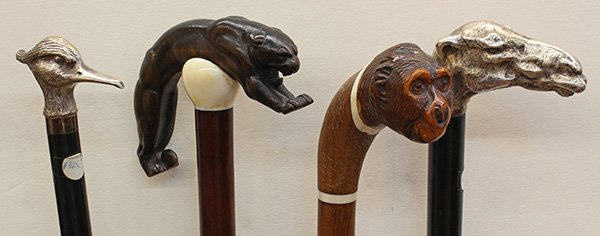 (lot of 4) Walking stick group, consisting of a knob: (lot of 4) Walking stick group, consisting of a knob handle stick, depicting a roadrunner bird head, executed in silver plate, above a sterling silver collar, surmounting an ebonized shaft, ending in 