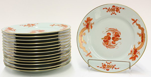(lot of 14) Limoges: (lot of 14) Limoges, France, Raynaud and Co. porcelain dessert plates, executed in the Asian taste, each decorated with a central reserve of two stylized birds in red with gilt accents, 8.75"dia. Prov