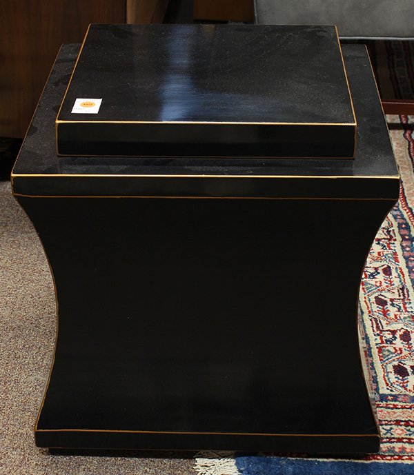 Hollywood Regency side table: Hollywood Regency side table, executed in ebonized wood with gilt highlights, having a square top surmounting a square body with convex sides, 19"h x 18"sq