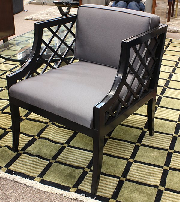 Hollywood Regency lattice chair by Grosfeld House: Hollywood Regency lattice chair by Grosfeld House, circa 1965, executed in ebonized wood, the low back leading to diminutive arms above lattice sides, with upholstered seat and back, the whole rising 