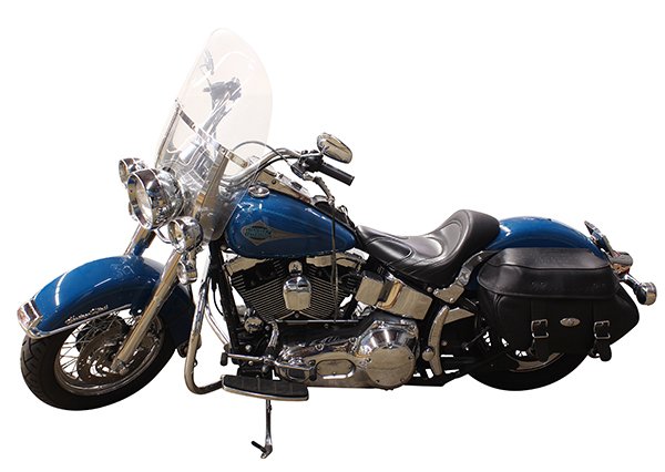 2001 Harley Davidson Heritage Softail Classic: 2001 Harley Davidson Heritage Softail Classic motorcycle, having a V-twin four-stroke engine, the exterior finished in Real Teal Pearl, and having a chrome spoke front wheel, customized to look like a