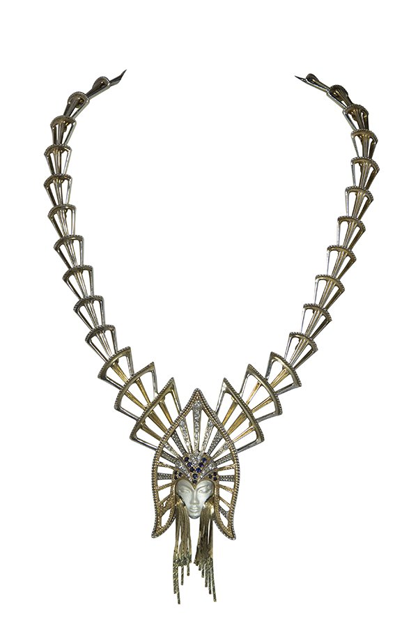 Erte "Mystere" convertible necklace: Erte "Mystere" mother-of-pearl, diamond, sapphire, 14k yellow gold and sterling silver convertible necklace a central mother-of-pearl cameo of a female decorated by round diamonds totaling approximate