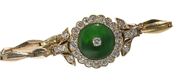 Jadeite, diamond and 14k yellow gold bracelet Mason-Kay: Jadeite, diamond and 14k yellow gold bracelet featuring a fine jadeite bi measuring approximately 15 x 3.8 mm, accompanied by a Mason-Kay Jadeite Authenticity report, stating Natural Jadeite Jade - No