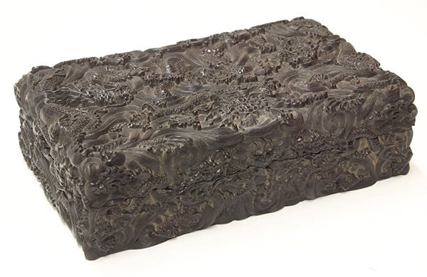 Chinese Wood Box with Dragons: Chinese rectangular wooden box, carved with dragons chasing a flaming pearl amid clouds, base carved with an apocryphal 'Qianlong Yu Wan' mark, 3.5"h × 12"w × 7.25"d