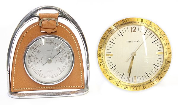 Tiffany & CO 'World Time' desk clock: (lot of 2) Tiffany & Co. 'World Time' desk clock, circa 1990, executed in brushed and polished gilt brass, of circular inclined, rotating bezel divided into sectors and with the names of 24 world citi