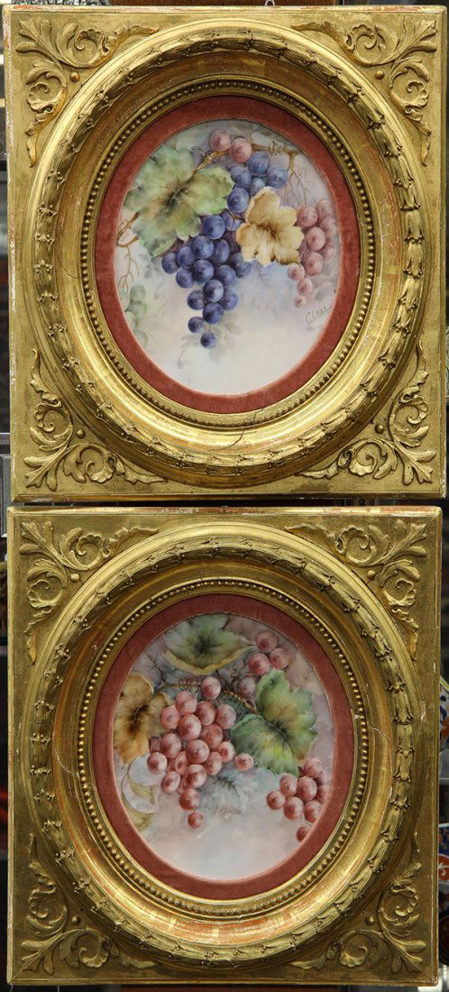 Pair of Jacque Gilman painted porcelain plaques, of: Pair of Jacque Gilman painted porcelain plaques, of oval form, depicting bunches of red, green, and black grapes on the vine, signed 'Gilman; lower right, and having label verso 'Jacque Gilman Design