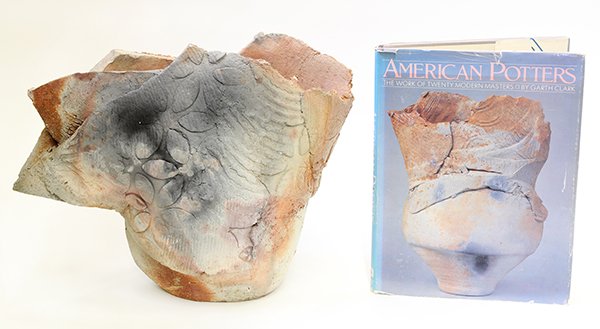 (lot of 2) Paul Soldner (American 1921-2011) 'Pedestal: (lot of 2) Paul Soldner (American 1921-2011) 'Pedestal Piece,' 1981, executed in low fired ceramic, the unglazed vessel with impressed and applied floral decoration in orange, black and white, 12"h x 