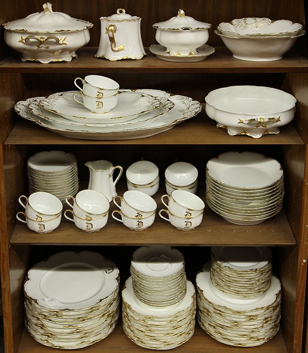 (lot of 92) Haviland porcelain gilt rimmed partial: (lot of 92) Haviland porcelain gilt rimmed partial dinner service for 12, each having a D monogram, consisting of dinner plates, 9.5"dia., salad plates, luncheon plates, bread plates, tea cups and sau
